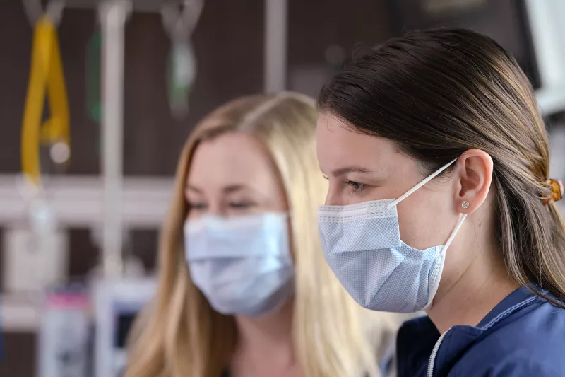 Two nurses in the middle of work